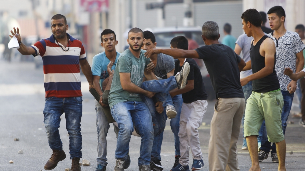West Bank violence: 13-year-old Palestinian shot dead in 